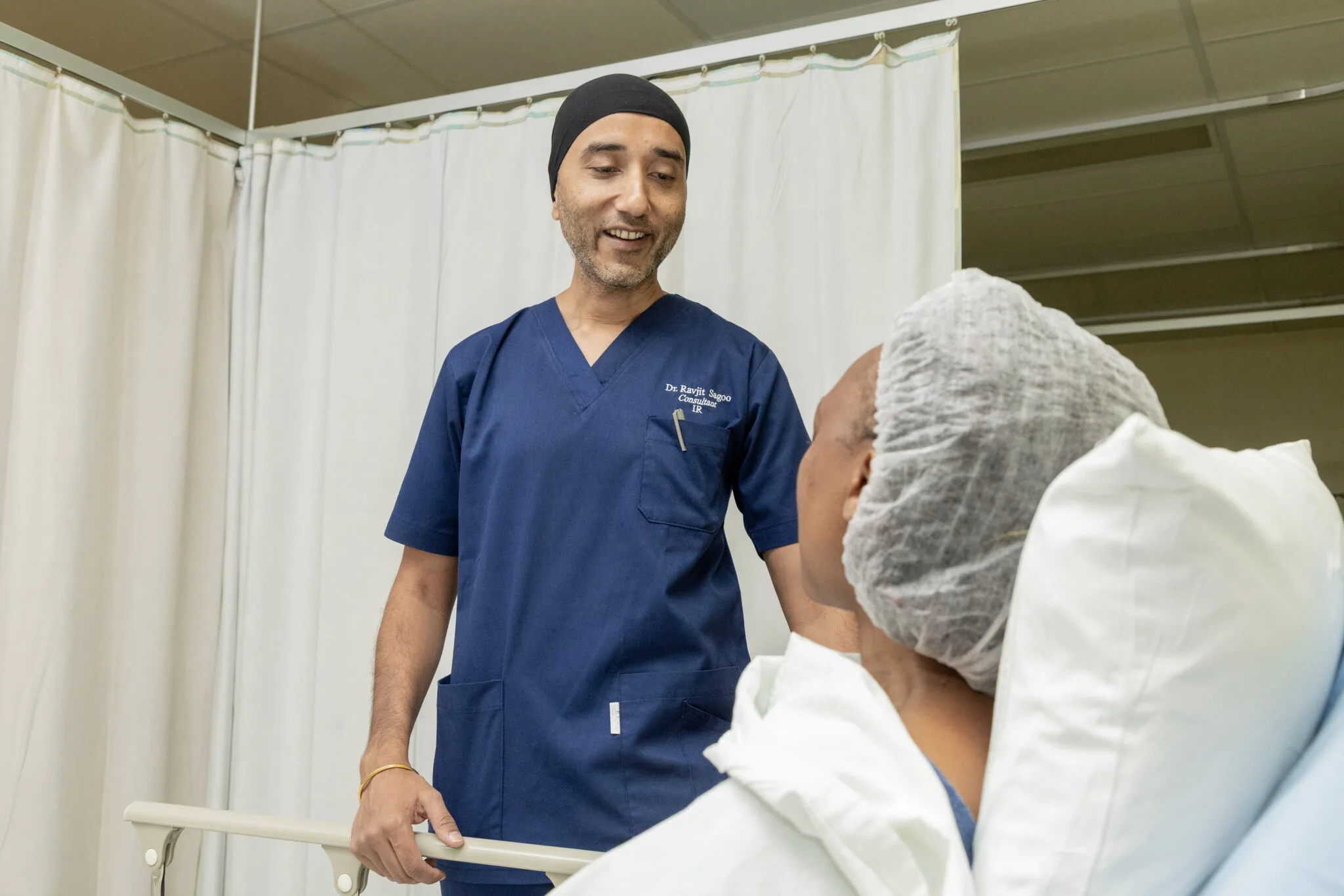 Dr Sagoo speaking a patient about Fibroid Removal Options offered in Kenya